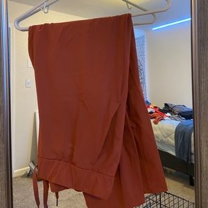 Lululemon on the fly pant dark coral size 10 NWOT